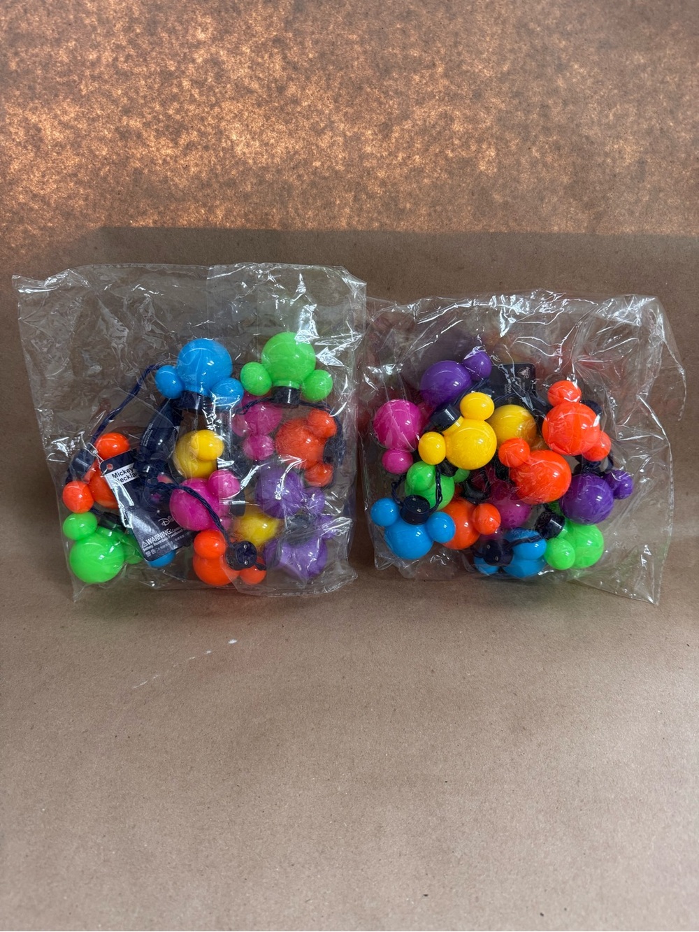 NWT Mickey Mouse Disneyland Hong Kong Glow Necklace. Set of 2